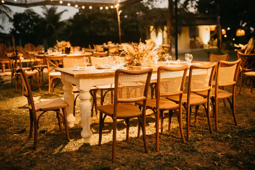 Elegant wedding reception table setup under warm lighting