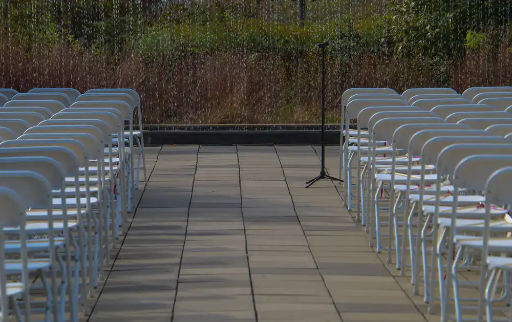 Beautifully arranged outdoor ceremony seating overlooking a scenic backdrop